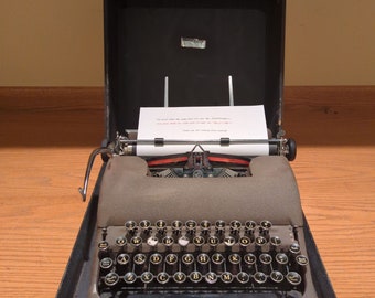1948 Smith Corona Sterling portable manual typewriter with carrying case