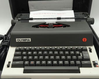 1970&#39;s Olympia X-L12 portable electric typewriter with case
