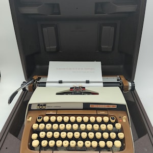 1978 Brown Smith Corona Classic 12 manual portable typewriter with carrying case