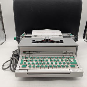 1971 Olivetti Praxis 48 electric typewriter with custom carrying case!