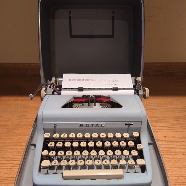 1956 Blue crinkle paint Royal Quiet Deluxe portable typewriter with carrying case