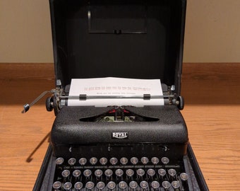 1941 Black Royal Arrow portable manual typewriter with carrying case