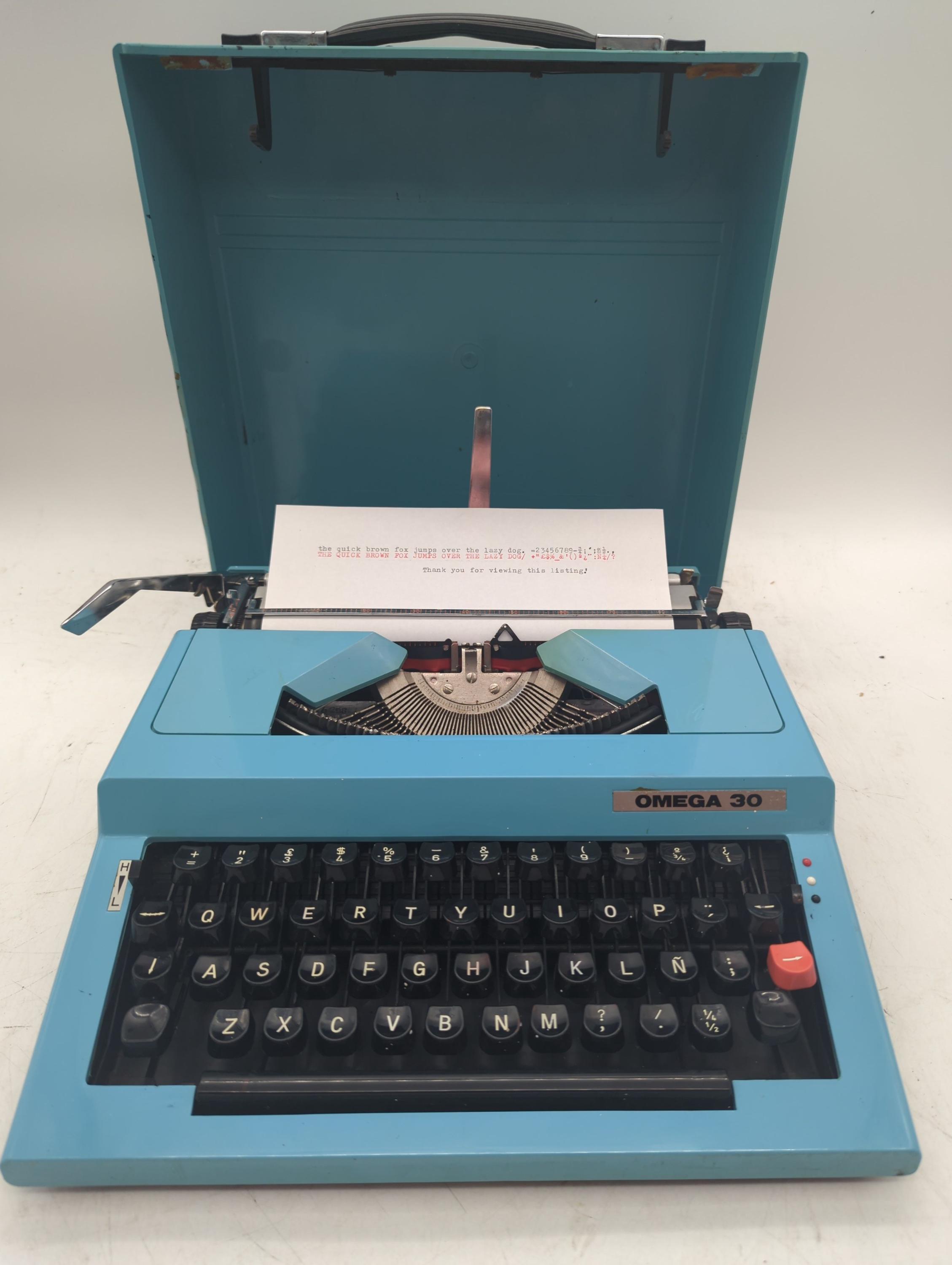 1980's Turquoise Omega 30 Portable Typewriter With Case - Spanish