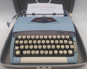 1960's Sky Blue Sears Citation 88 portable manual typewriter with case - Smith Corona clone