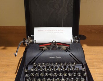 1946 Smith Corona Sterling portable manual typewriter with carrying case