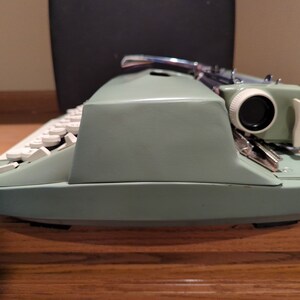 1969 Avocado Green Smith Corona Super Sterling portable typewriter with case image 8