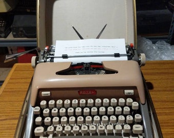 1960 Salmon Pink and Gray Royal Futura 800 portable typewriter with case - curvy!