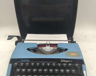 1975 blue Brother Charger 11 Correction portable manual typewriter with carrying case