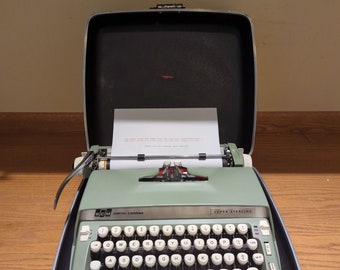 1967 Avocado Green Smith Corona Super Sterling portable typewriter with case