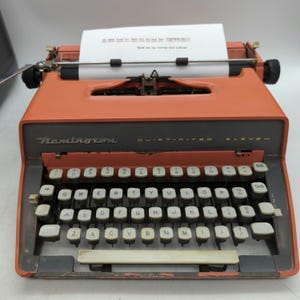 1960 Salmon Pink Remington Quiet-riter Eleven Portable Manual