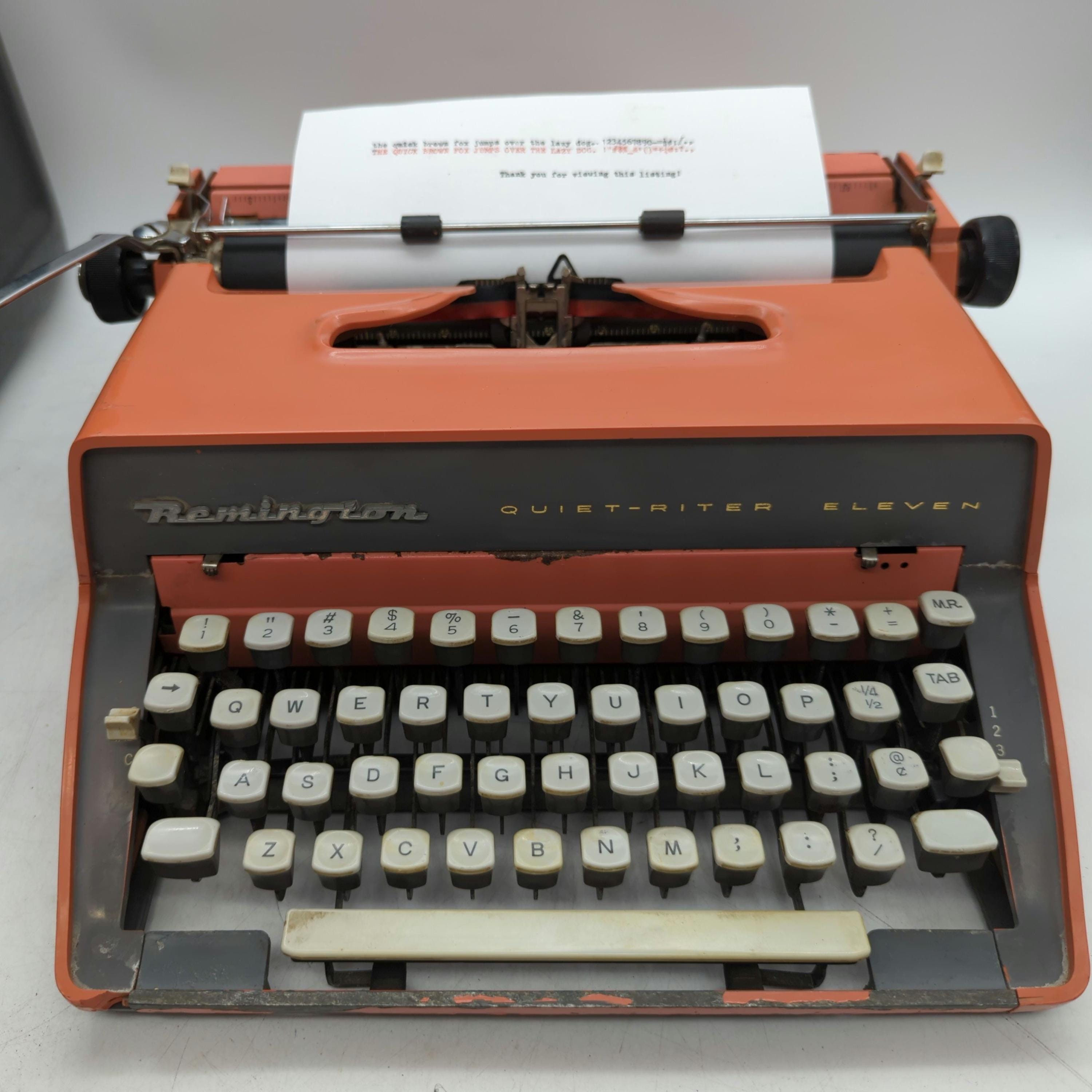 1960 Salmon Pink Remington Quiet-Riter Eleven portable manual