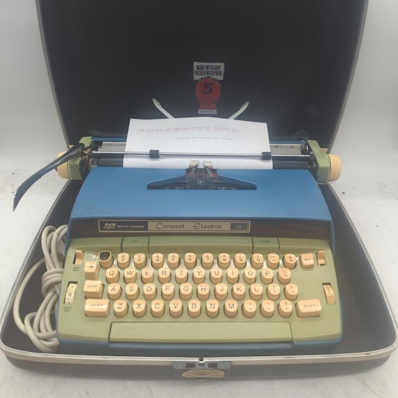 1960's Blue Smith Corona Coronet Electric 12 Portable Electric