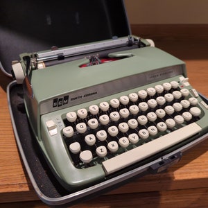 1969 Avocado Green Smith Corona Super Sterling portable typewriter with case image 4
