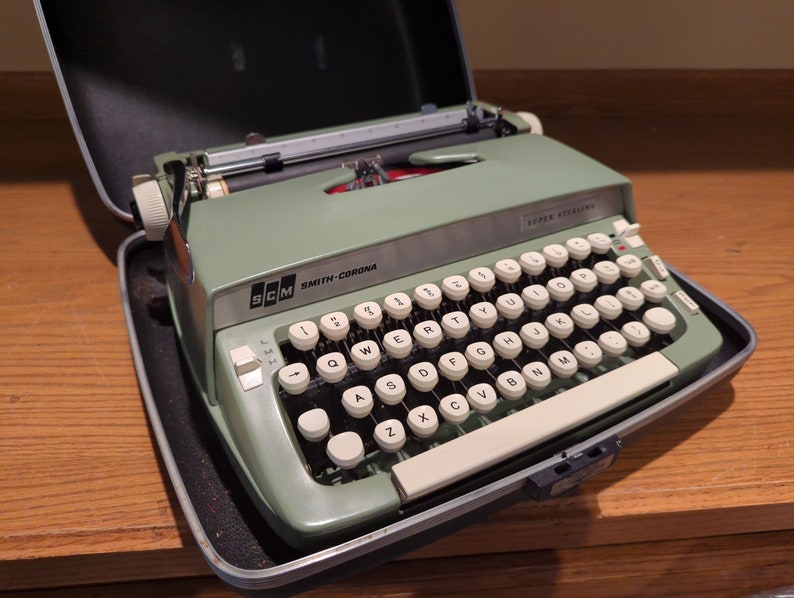 1969 Avocado Green Smith Corona Super Sterling portable typewriter with case image 4