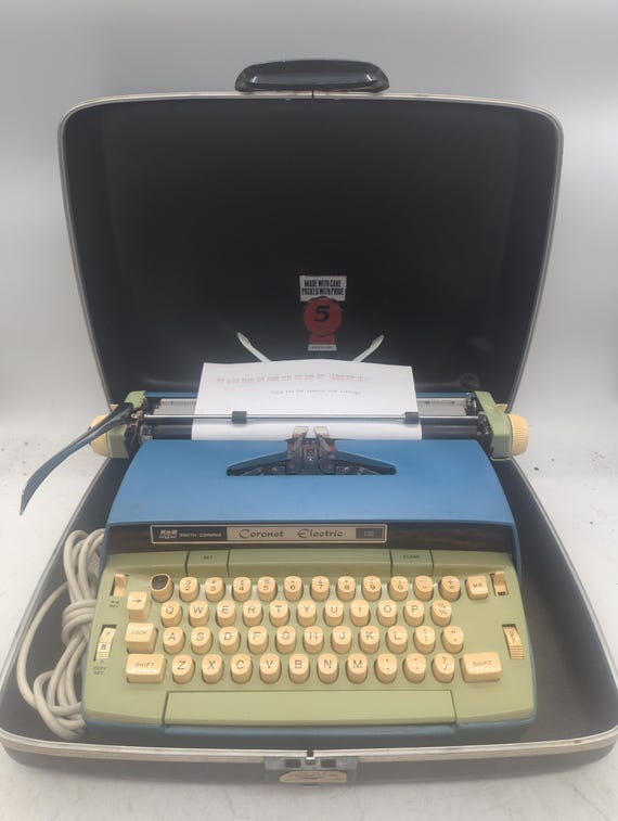 1960's Blue Smith Corona Coronet Electric 12 Portable Electric