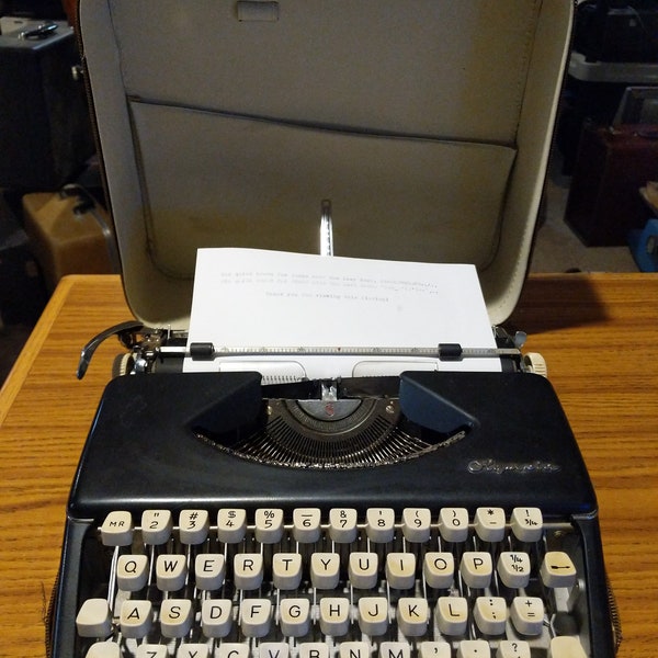 1959 Black Olympia SF machine à écrire manuelle ultra portable