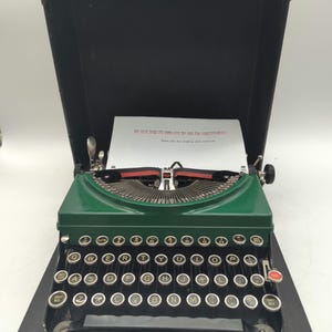 1934 Green and Black Remington 5 portable manual typewriter with case - boxy version