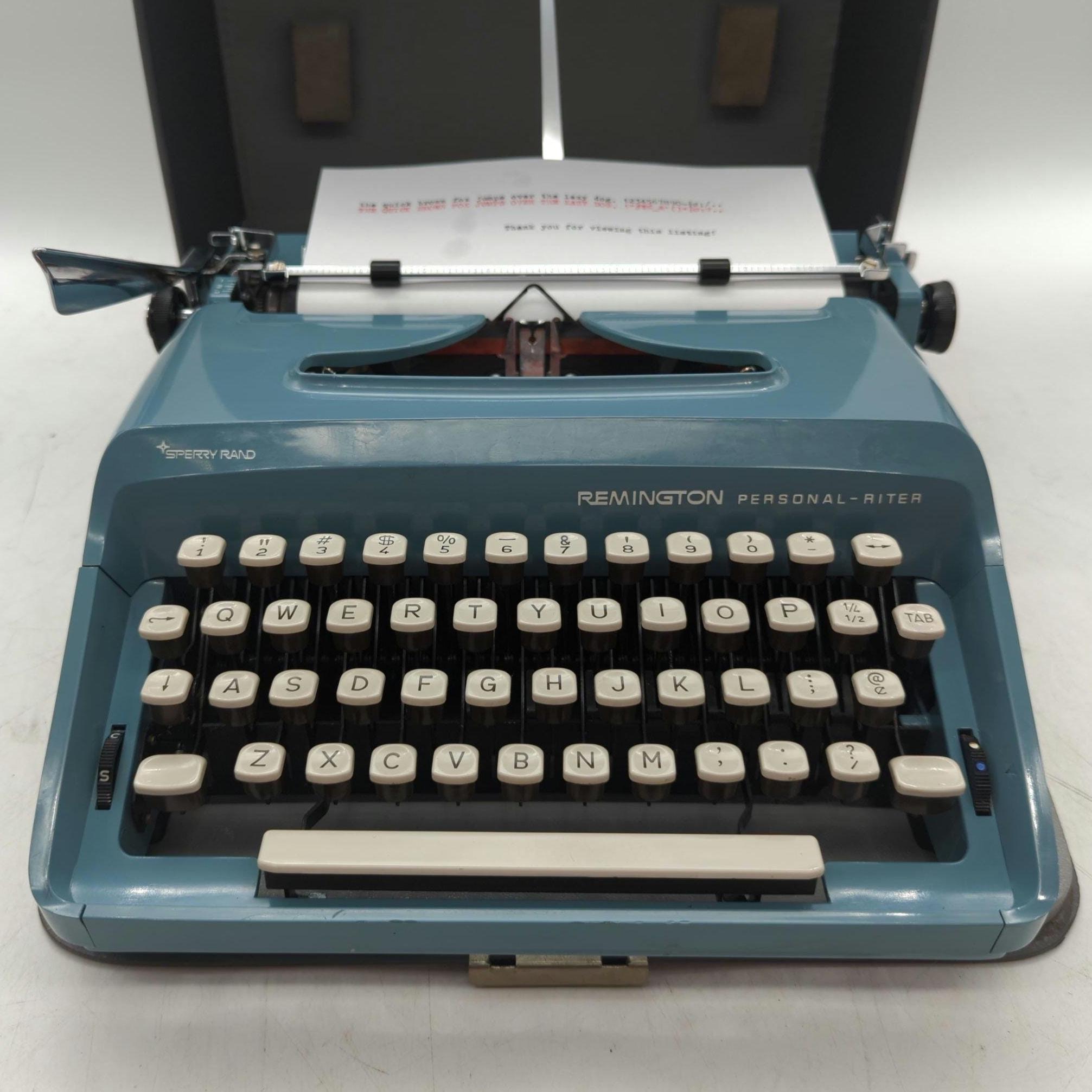 1960's blue Remington Personal-Riter portable typewriter with case