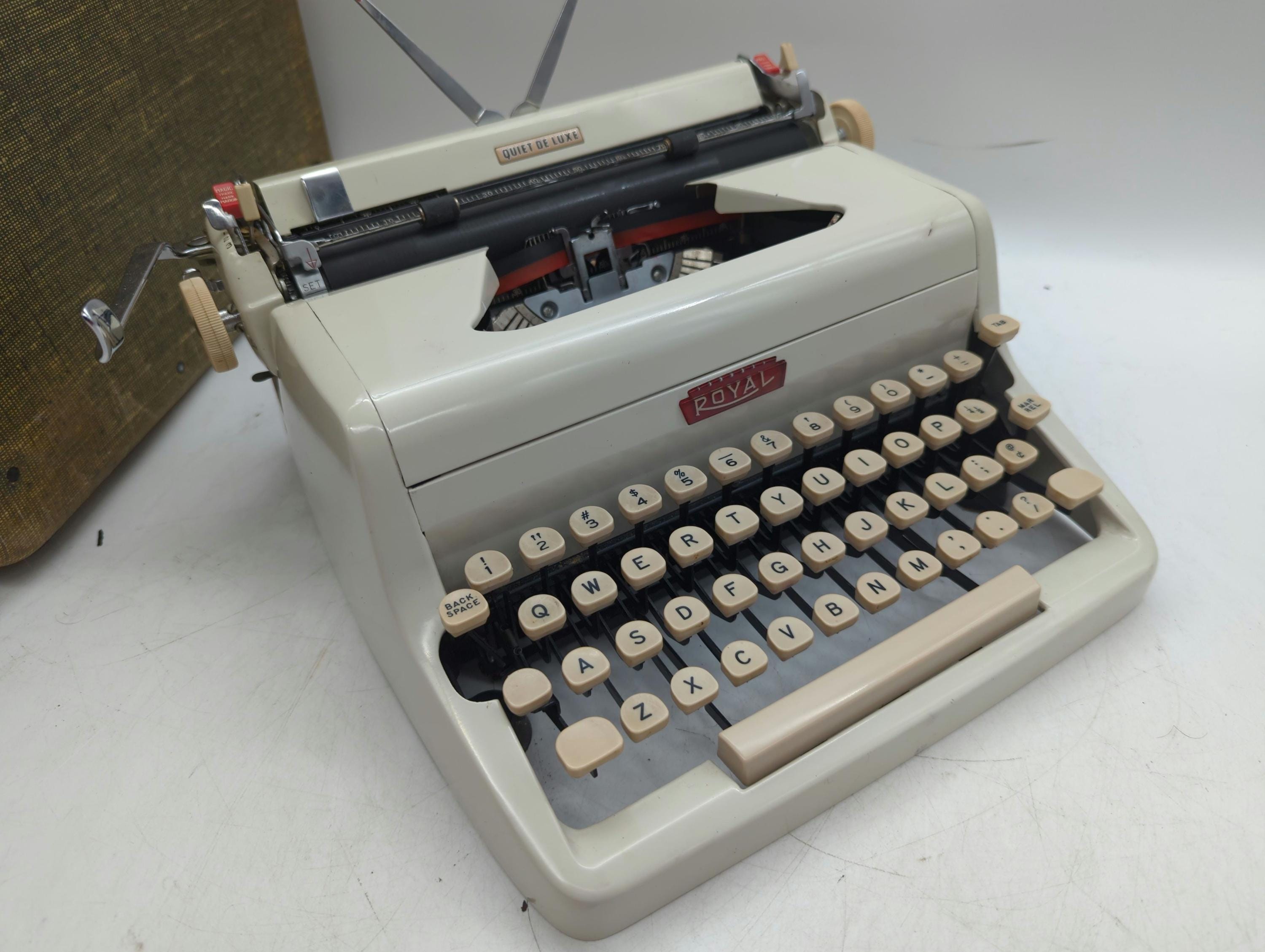 1958 White Royal Quiet Deluxe portable typewriter with case