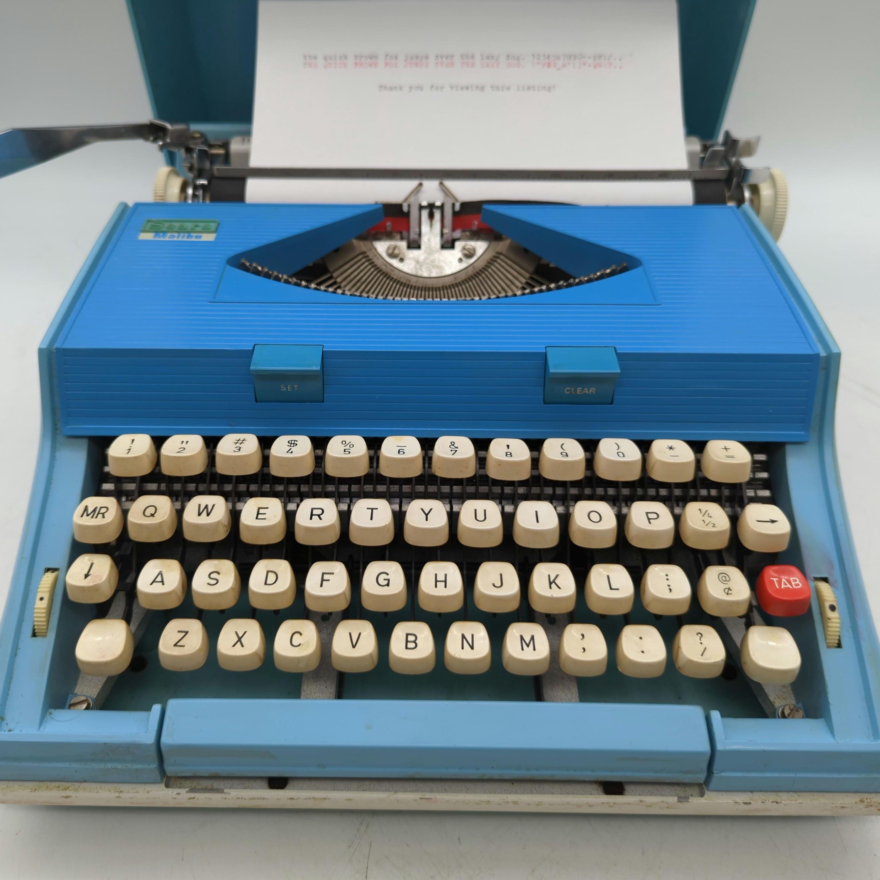 1960's Sky and Cerulean Blue Two Tone Sears Malibu Portable 1960's Sky and Cerulean Blue Two Tone Sears Malibu Portable