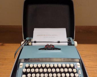 1969 Starmist Blue Smith Corona Super Sterling portable typewriter with case