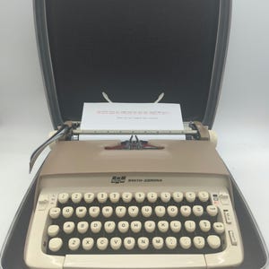 1964 Tan Smith Corona Galaxie manual portable typewriter with case