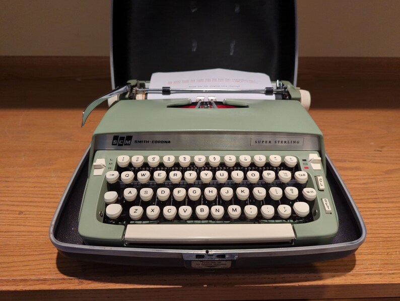 1969 Avocado Green Smith Corona Super Sterling portable typewriter with case image 2