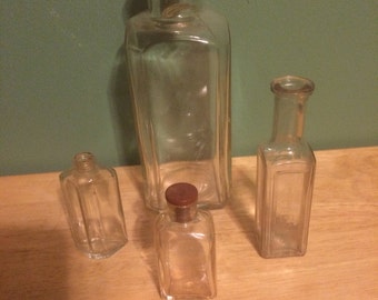 4 Vintage Perfume Bottles (Clear Colored Glass)