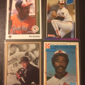 Baltimore Orioles (4 Cards) 1989 Phil Bradly, 1989 Donruss Gregg Olson, 1984 Eddie Murray & 1992 Ben McDonald