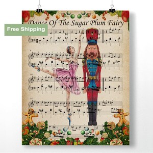 May include: A poster featuring a ballerina in a pink dress and a nutcracker soldier on a musical score background. The text "Dance Of The Sugar Plum Fairy" is at the top. Festive holiday decorations are at the bottom.