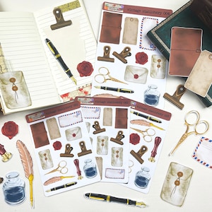 May include: Vintage stationery stickers featuring illustrations of envelopes, pens, scissors, inkwells, and other office supplies. The stickers are on a white background and have a vintage aesthetic.