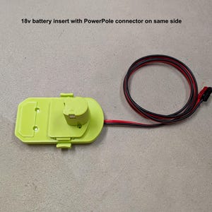 May include: A lime green 18v battery insert with a PowerPole connector on the same side. A black and red wire is connected to the insert. The text "18v battery insert with PowerPole connector on same side" is visible.