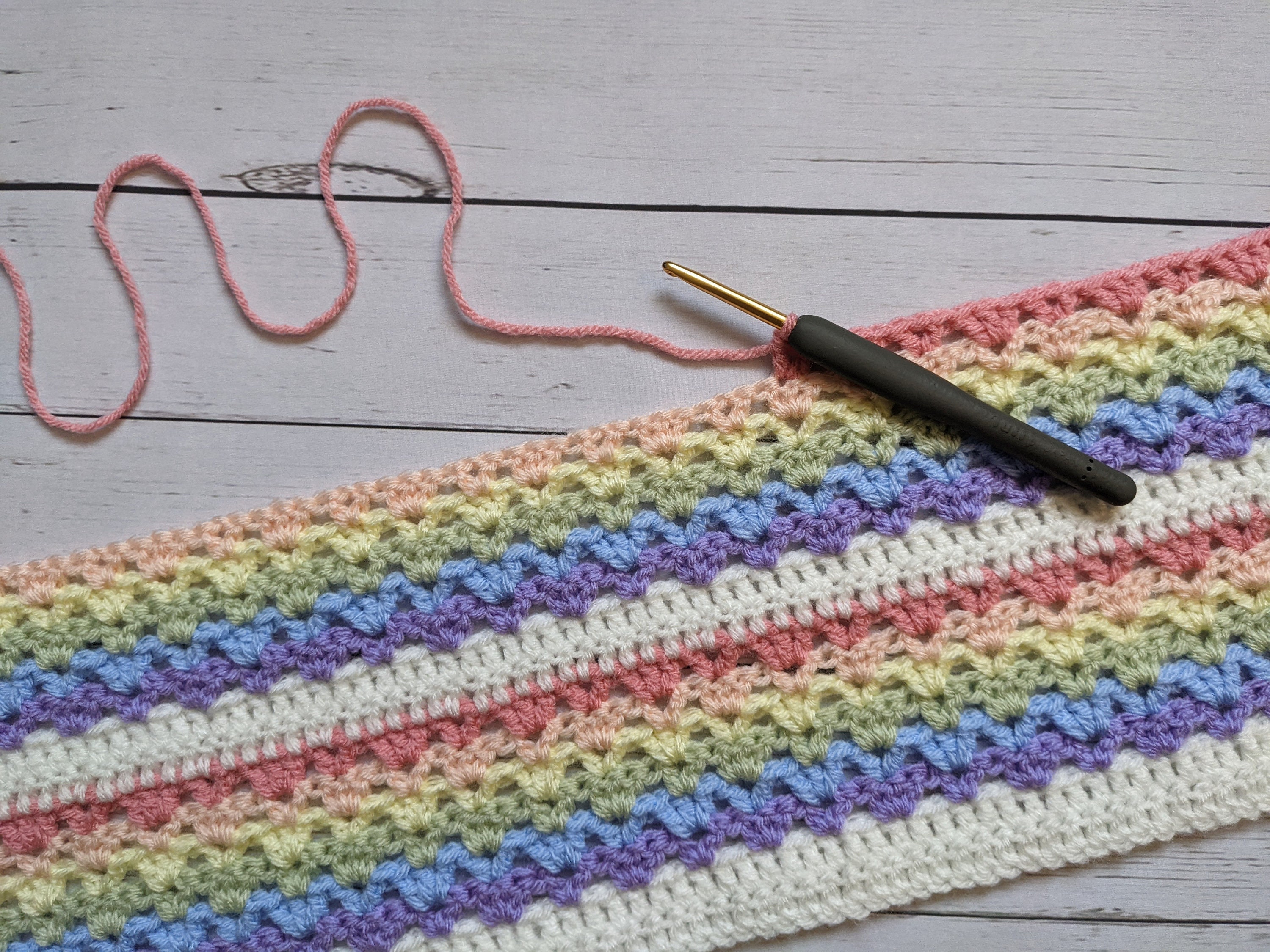 30 Rainbow Blanket Crochet Patterns to Brighten Baby Rooms, Throws, and Gift Giving 13 Jubilee Rainbow Blanket Crochet Pattern