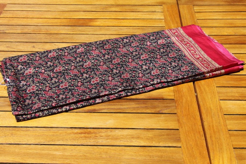 fabric coupon. Black saree with red flowers viscose sari