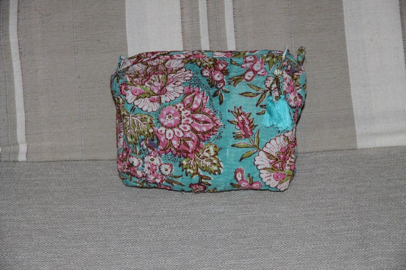 Three sizes of quilted toilet bags make-up medications. jewelry storage pouch