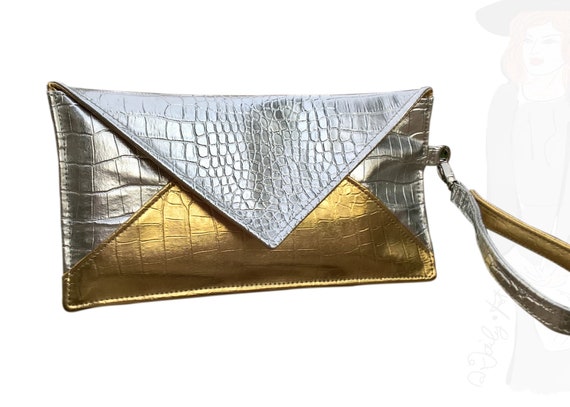 silver clutch bag with wrist strap