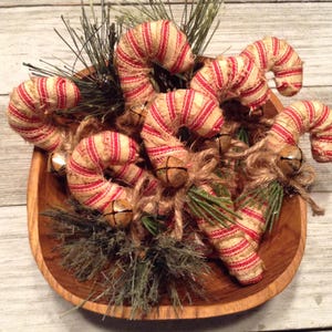 Primitive Candy Cane Bowl Fillers wrapped in Red Ticking fabric with Rusty Bell Ornament 4 inch