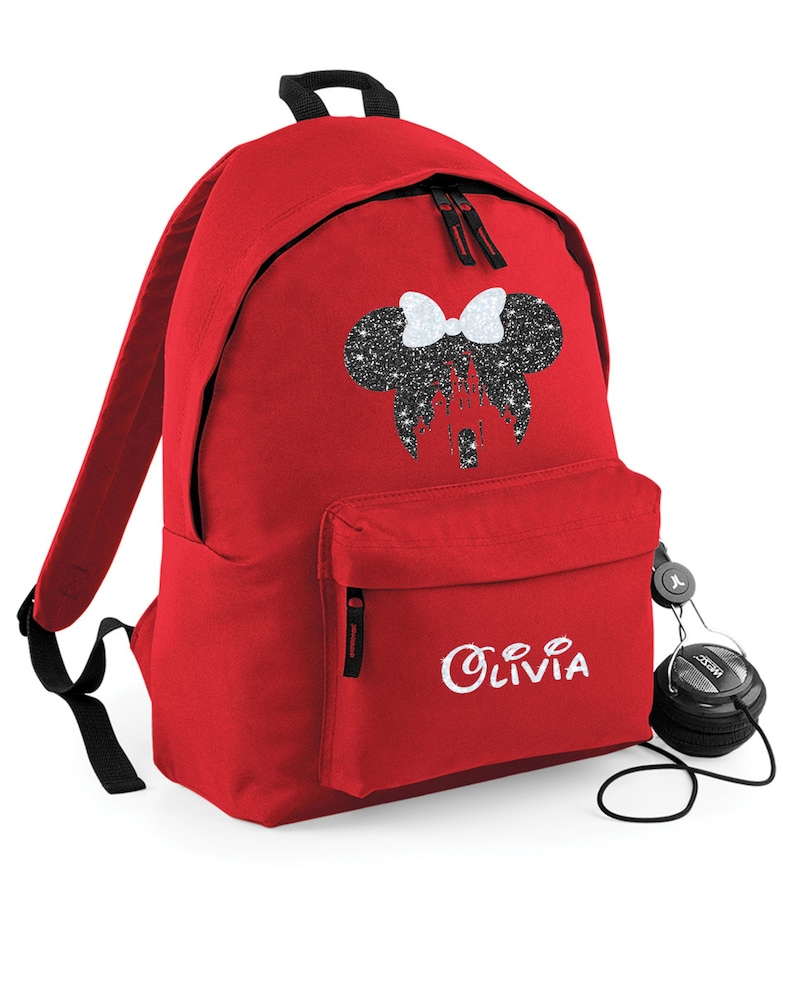 May include: Red backpack with a black glitter Minnie Mouse design and the name "Olivia" embroidered in white on the front.