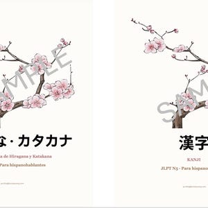 May include: Two educational posters featuring a brown tree branch with pink cherry blossoms. The left poster displays the text "ひらがな・カタカナ", "Guia Completa de Hiragana y Katakana", and "JLPT N5 - Para hispanohablantes". The right poster displays "漢字", "KANJI", and "JLPT N5 - Para hispanohablantes".