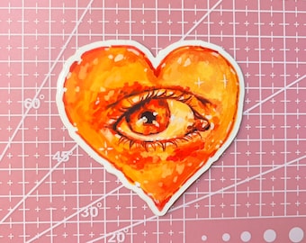 Orange heart eye vinyl sticker
