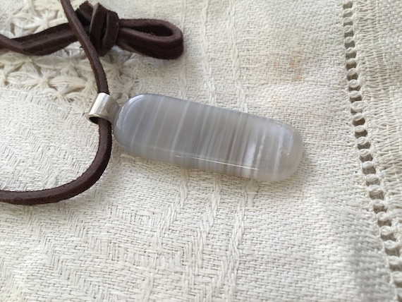 White Mans stone and rawhide pendent/white boho necklace/white agate and sterling jewelry / arizona agate stone pendant/ unisex necklace