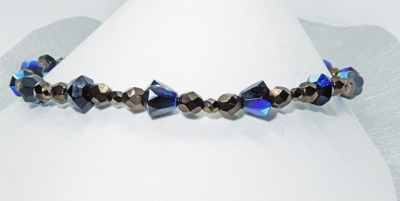 Czech glass and Bali Silver with garnet accent and a with sterling toggle. 16 inch choker necklace