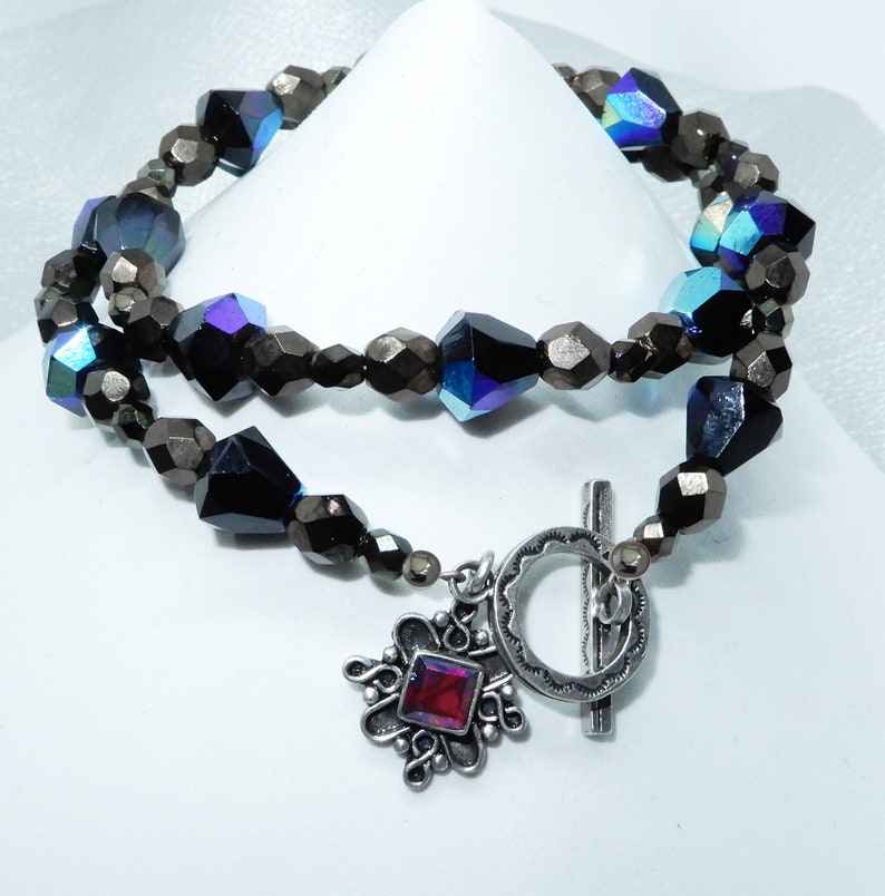 Czech glass and Bali Silver with garnet accent and a with sterling toggle. 16 inch choker necklace