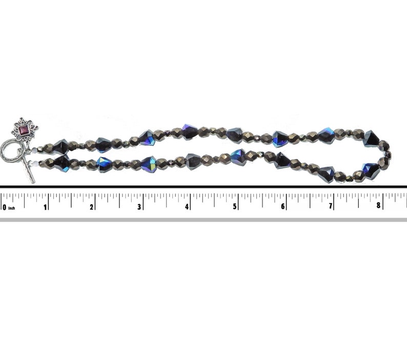 Czech glass and Bali Silver with garnet accent and a with sterling toggle. 16 inch choker necklace