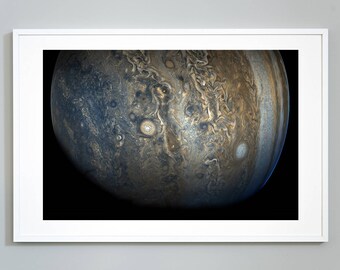 May include: A close-up image of Jupiter, a gas giant with swirling clouds in shades of brown, white, and blue.