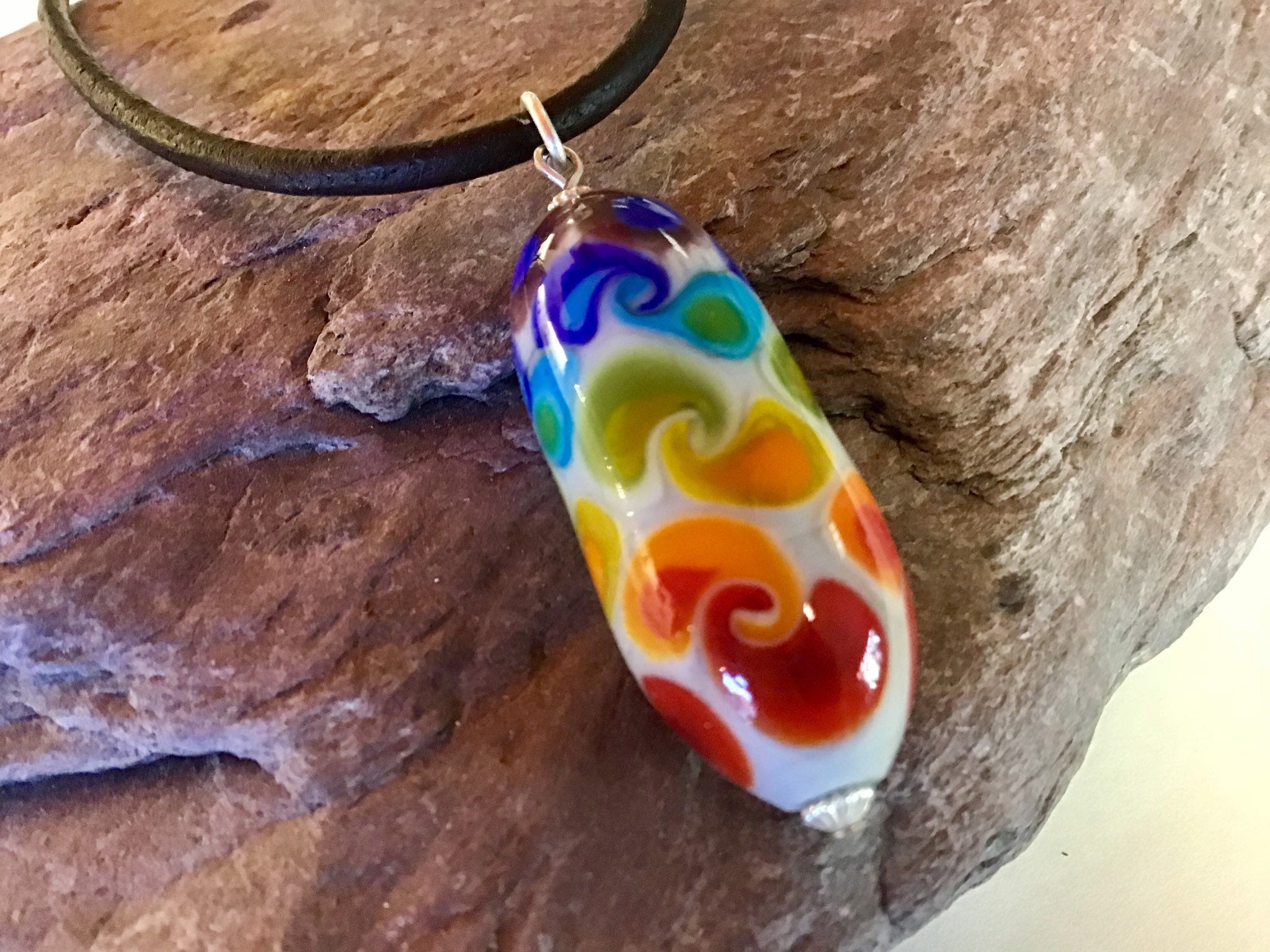 Handmade rainbow chakra necklace. Lampwork glass bead. | Etsy