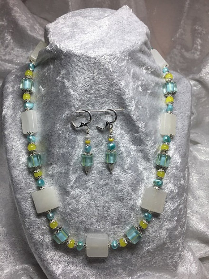 Italian marble and lamp work necklace and earring set.