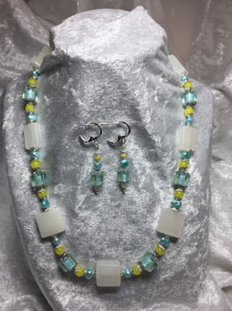 Italian marble and lamp work necklace and earring set.