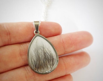 Memorial hair necklace made in stainless steel pendant. For pet or human hair.