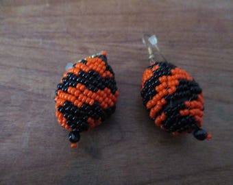 Bande originale tissée noir, oreilles orange.